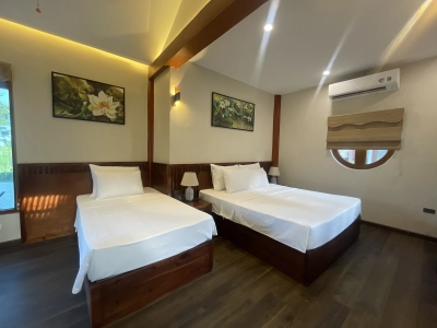 Deluxe Triple Riverside/Garden View